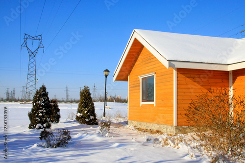 Cabin and pylon in the snow