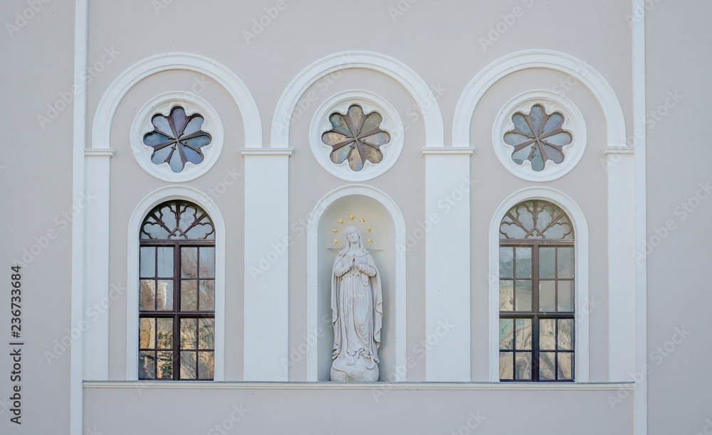 The statue above the entrance to the church Merciful Brothers in Pecs