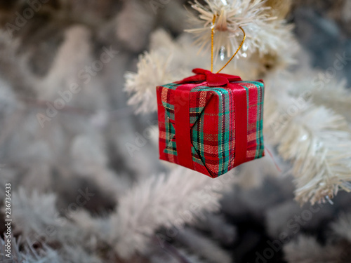 gift box decoration on white Christmas tree