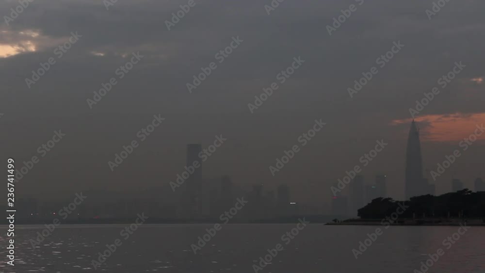 Shenzhen bay at evening, Guangdong province, China. Overcast sky over Nanshan district Shenzhen bay at evening, Guangdong province, China. Overcast sky over Nanshan district