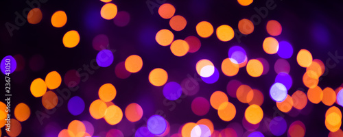 Multicolored Holiday Background with bright bokeh lights