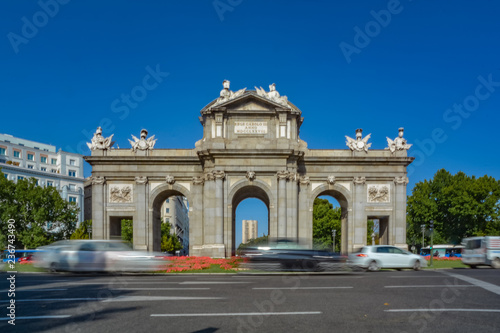 Puerta de Alcala, famous spanish monument, on a sunny day. Madrid, Spain.