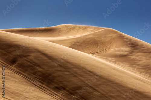 Dunes in Desert Sahara in Merzouga, Morocco. Beautiful lines of desert with sky in background