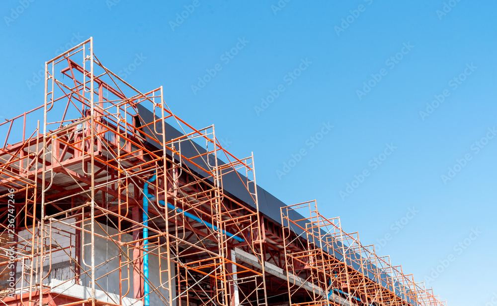 building construction site with soft-focus and over light in the background