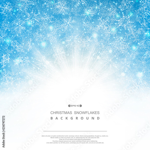 Abstract background of blue sky Christmas snowflakes pattern fantasy with classic sunburst.
