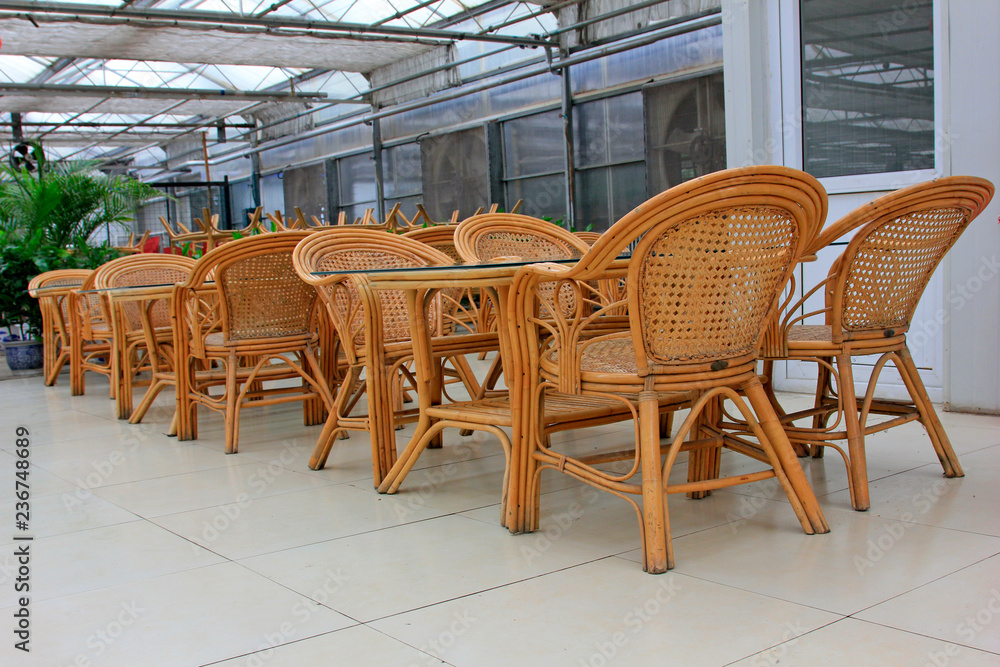 Bamboo chair and glass tea table