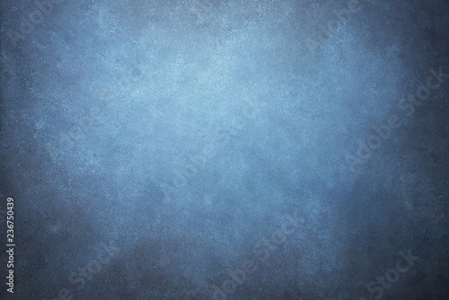 Fototapeta Blue painted canvas or muslin fabric cloth studio backdrop or background