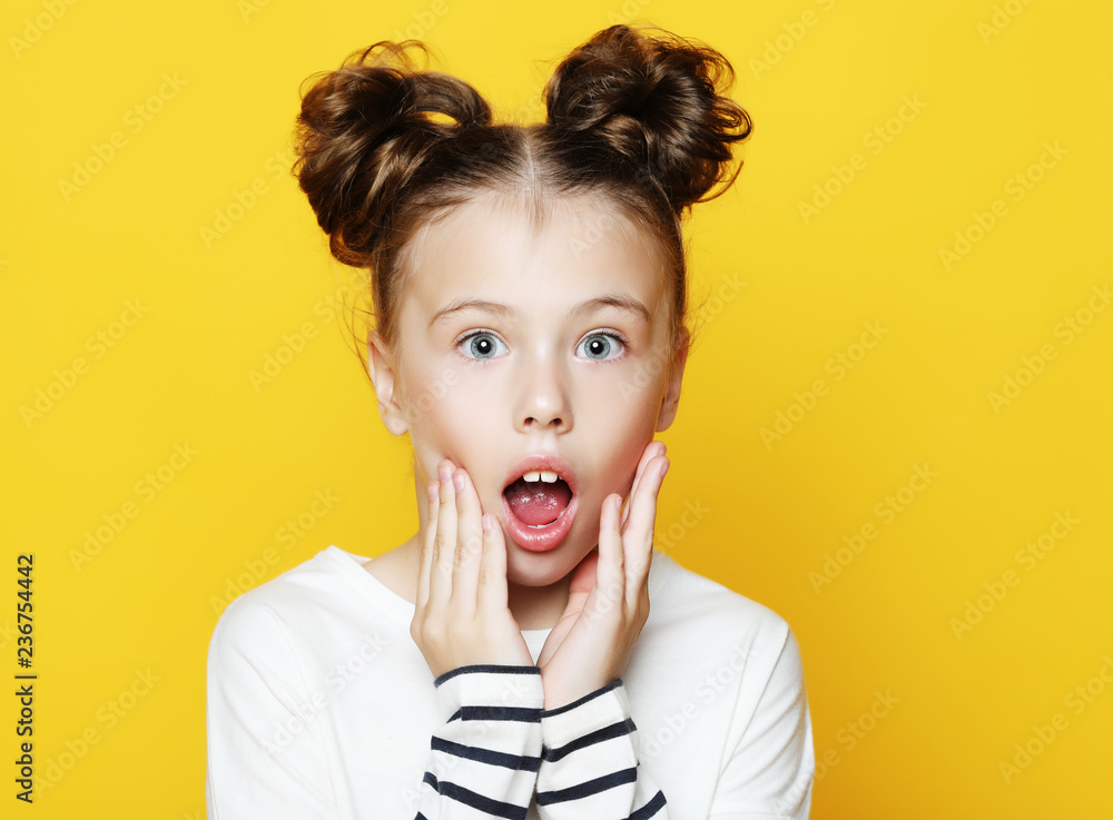 Portrait of little girl with opened mouth and crazy expression. Portrait of little girl with opened mouth and crazy expression.