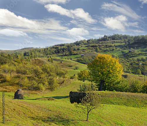 Maramures - Typical countryside near the village Poienile Izei. Poienile Izei is a commune in Maramures County, Romania. photo