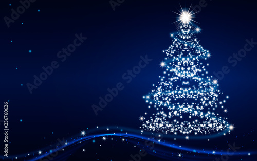 The Magic Christmas Tree. Merry Christmas and happy New Year greeting card with copy-space. Blue Christmas background.