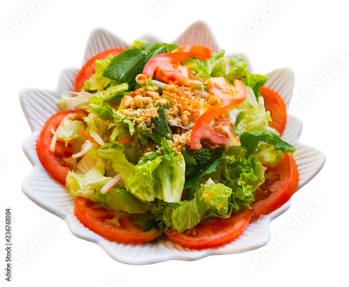 Salad with chicken, lettuce, mint and tomatoes