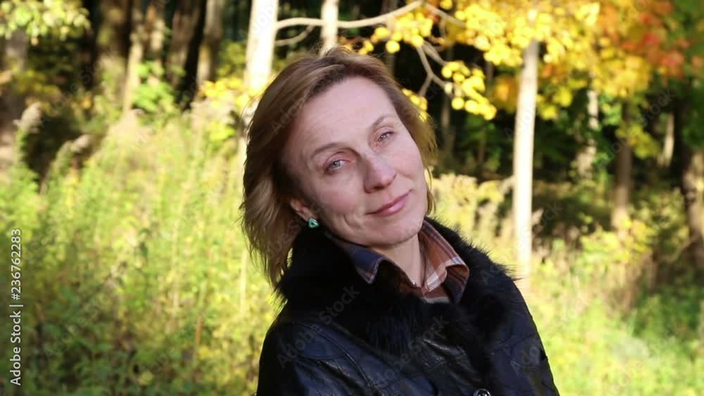 Beautiful woman in the autumn park.
Beautiful woman in the autumn park.