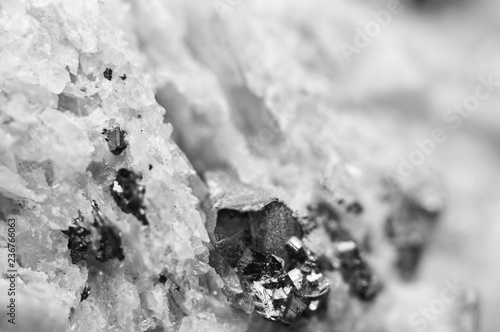 Crystals Rhodochrosite with particles of Pyrite. Black-and white  texture of mineral for background.  Macro © assistant