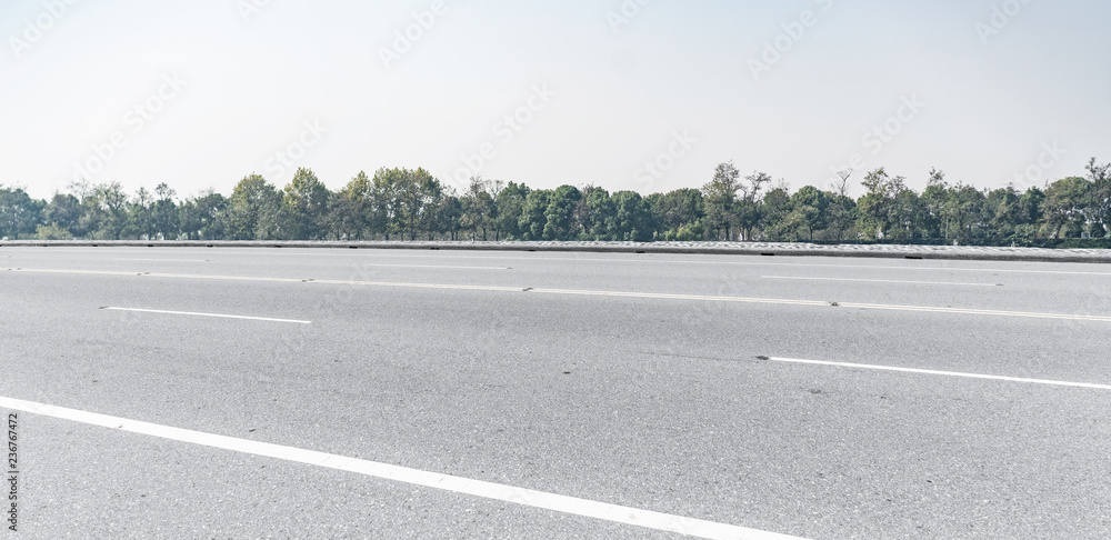 Panoramic skyline and mountains with empty road Panoramic skyline and mountains with empty road