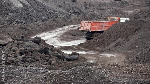 A large truck full of waste goes to the quarry. Lucky waste (metal) for recycling.