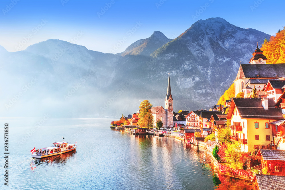 Naklejka premium Hallstatt village on Hallstatter See Lake in High Alps Mountains. Picturesque landscape of Great Alpine nature. Hallstatt is famous romantic European UNESCO travel destination.