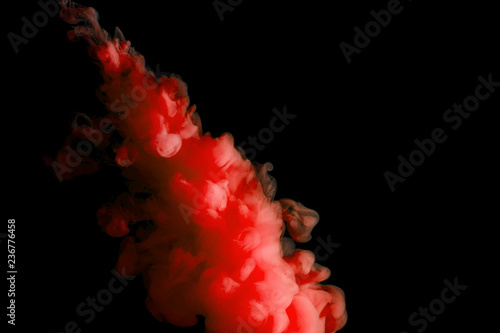 paint stream in water, red colored ink cloud, abstract background
