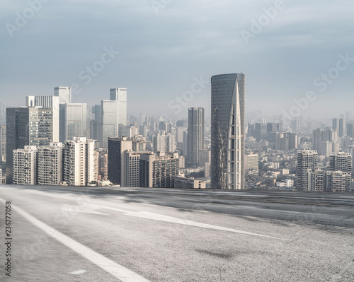 Panoramic skyline and buildings with empty road 