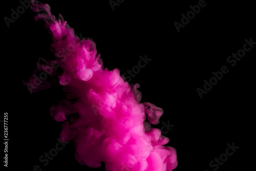 paint stream in water, pink colored ink cloud, abstract background