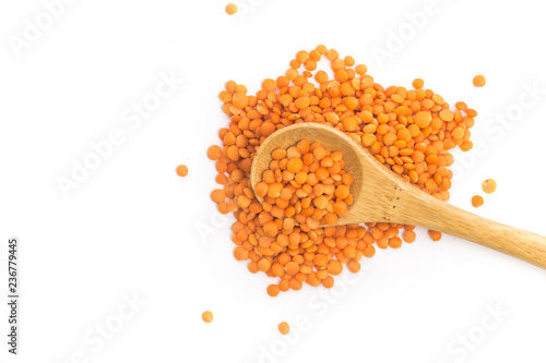 Red lentils in a spoon. Top view