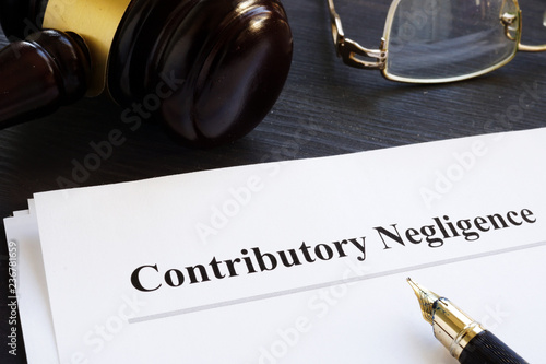 Documents about contributory negligence in a court. photo