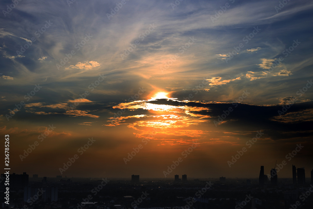 Fototapeta premium Dark cloud with blue light sky background and city light midnight evening time