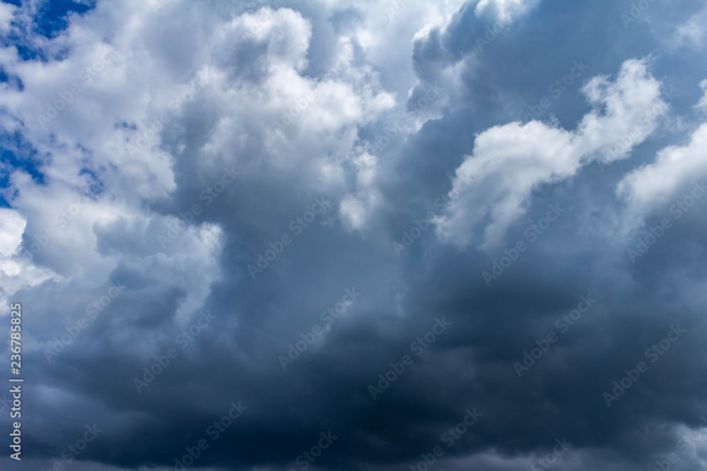 A densely cloudy sky with storm clouds. Resource for designers.