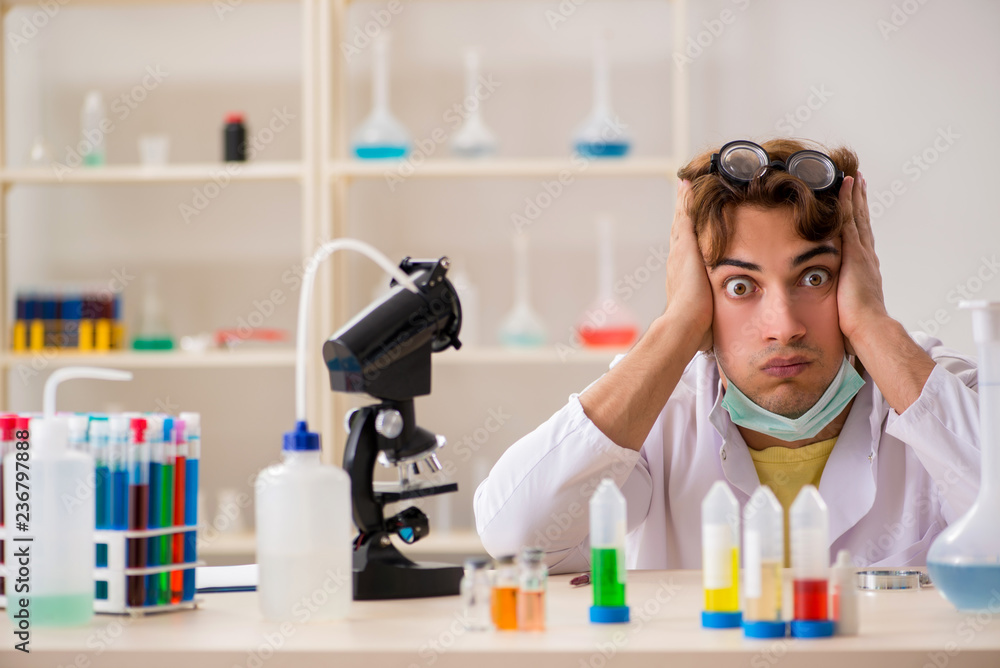 Funny crazy chemist doing experiments and tests Funny crazy chemist doing experiments and tests