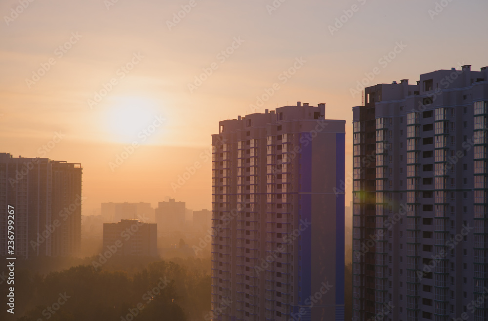 sunset and smog at the urban city