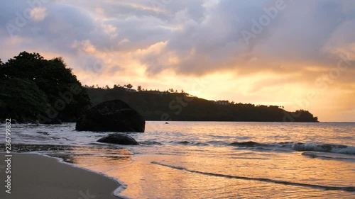 Cool Water Reflection Fade Away Beach Waves Orange Sky Glowing Sunset Anini Beach Kauai Hawaii photo