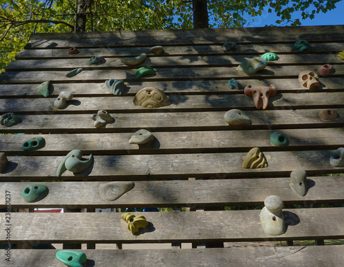 rock wall for kids at park showing steps to climb