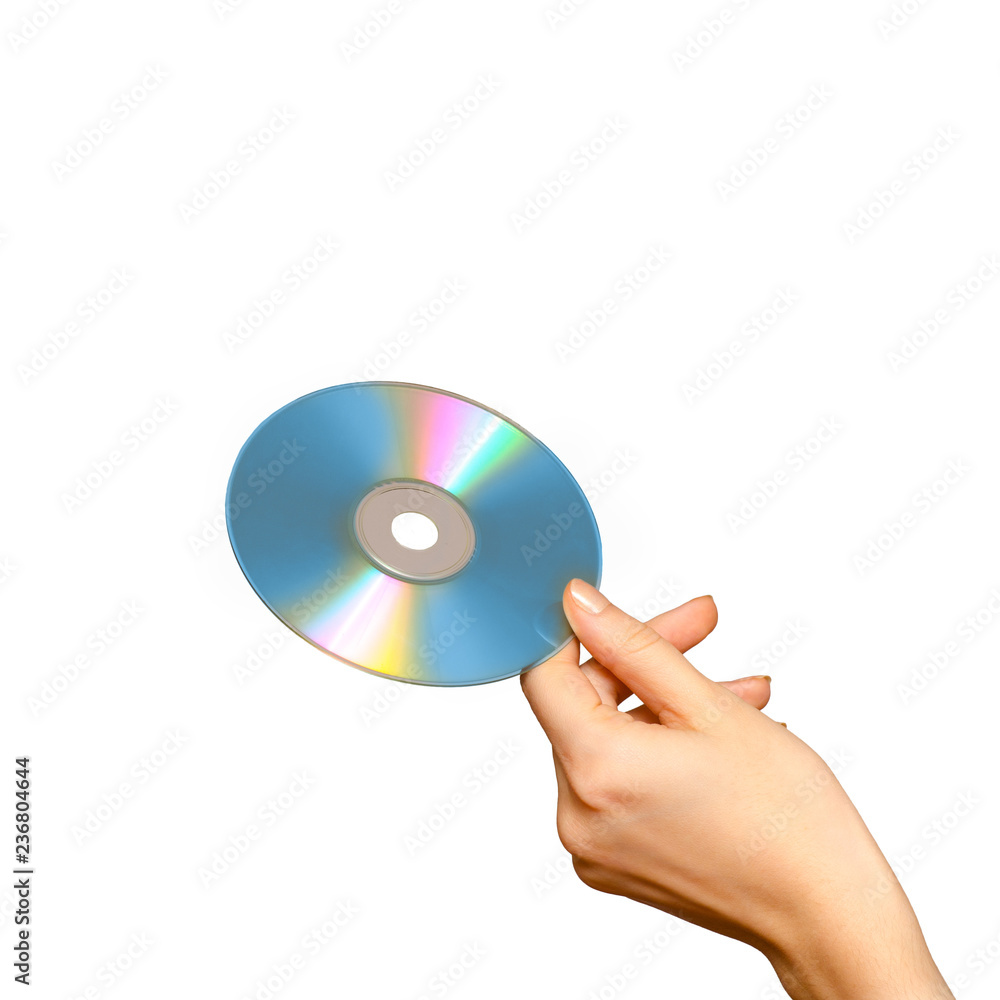 Female hand holding DVD, isolated on white Female hand holding DVD, isolated on white