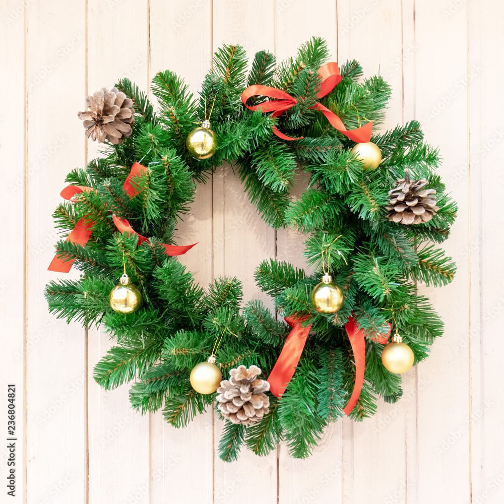 Christmas wreath for decorations on the door. Christmas background, new year, winter holiday Christmas wreath for decorations on the door. Christmas background, new year, winter holiday