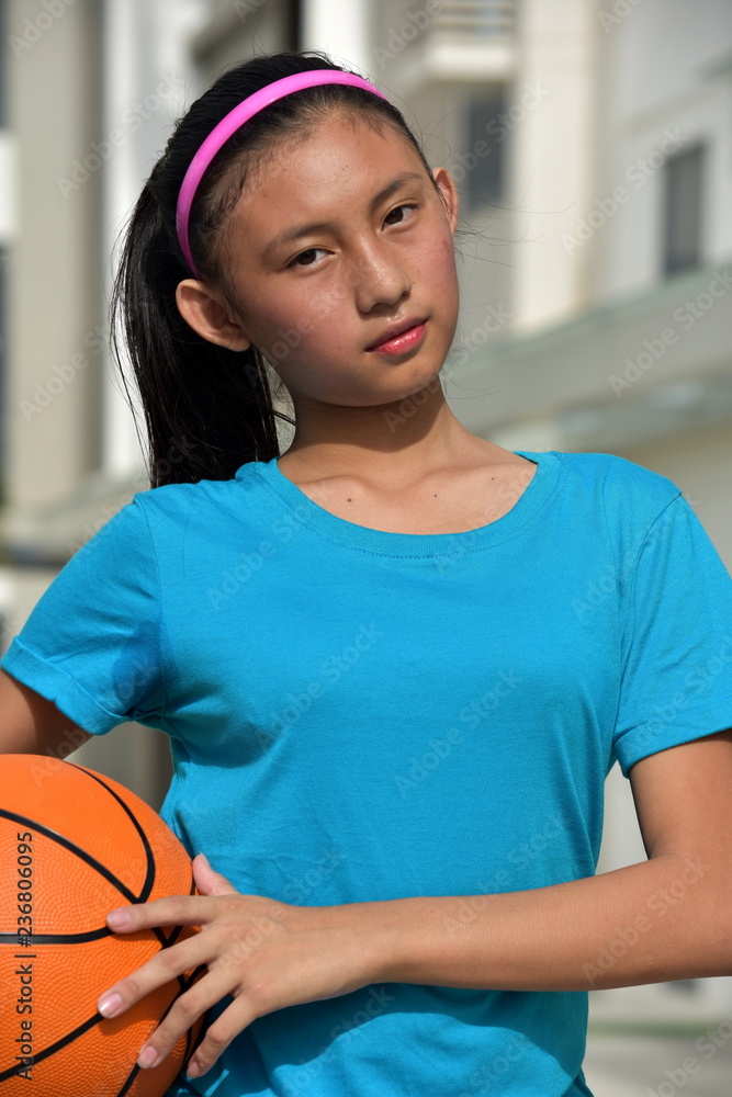 Unemotional Minority Person With Basketball Unemotional Minority Person With Basketball
