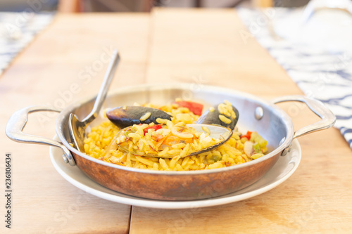 Delicious Spanish paella with mussels and seafoods