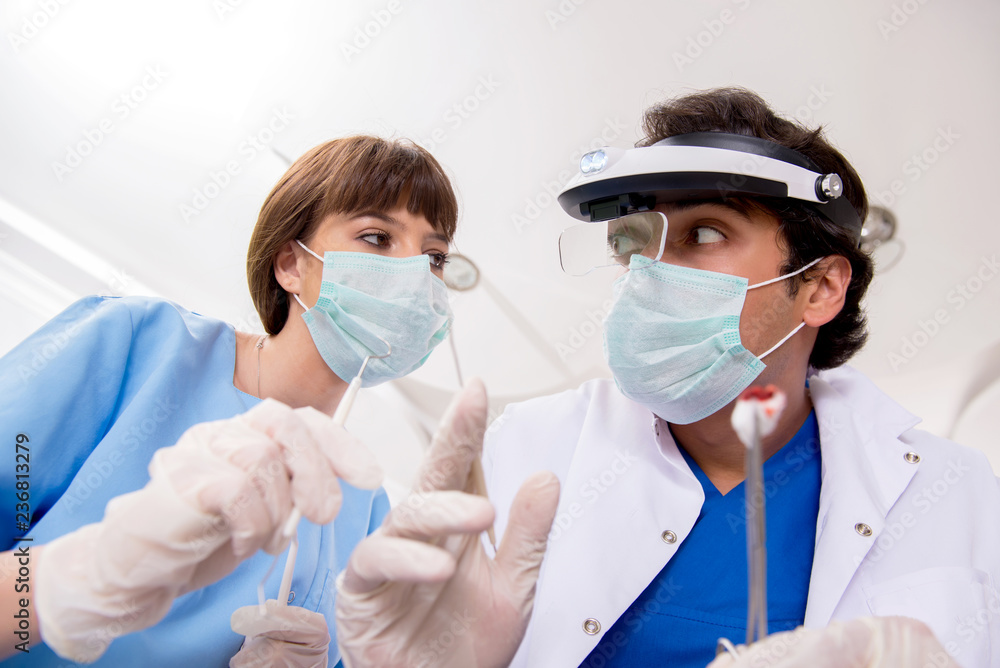 Concept of treating teeth at dentists Concept of treating teeth at dentists