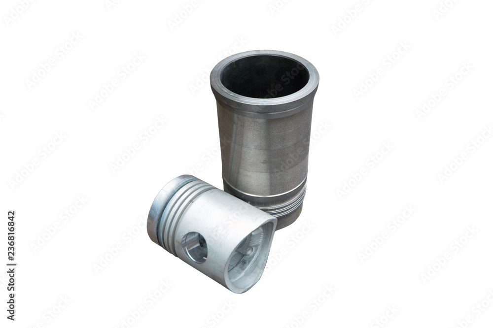 spare parts pistons and cylinders for an internal combustion engine on a white background spare parts pistons and cylinders for an internal combustion engine on a white background