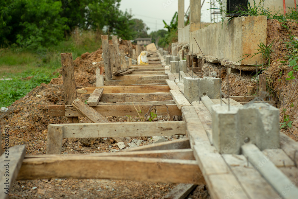 Fototapeta premium Selective focus picture of reinforcement steel of concrete structure at the construction site.