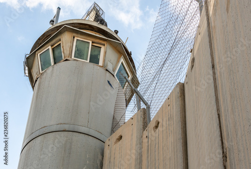 Israeli guard tower on the border wall with Palestine at Bethlehem photo