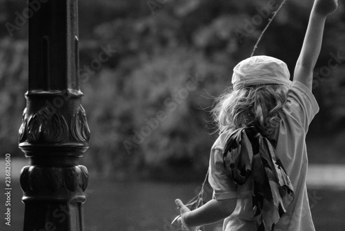 Child Fishing in Park