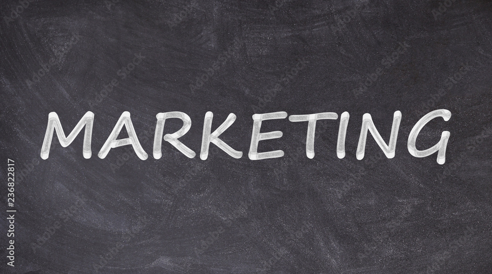 Fototapeta premium Marketing written on blackboard
