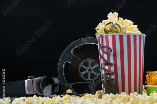 paper cups and film from an old video camera on popcorn
