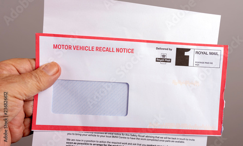 Official notification letter and envelope for a UK car safety recall photo