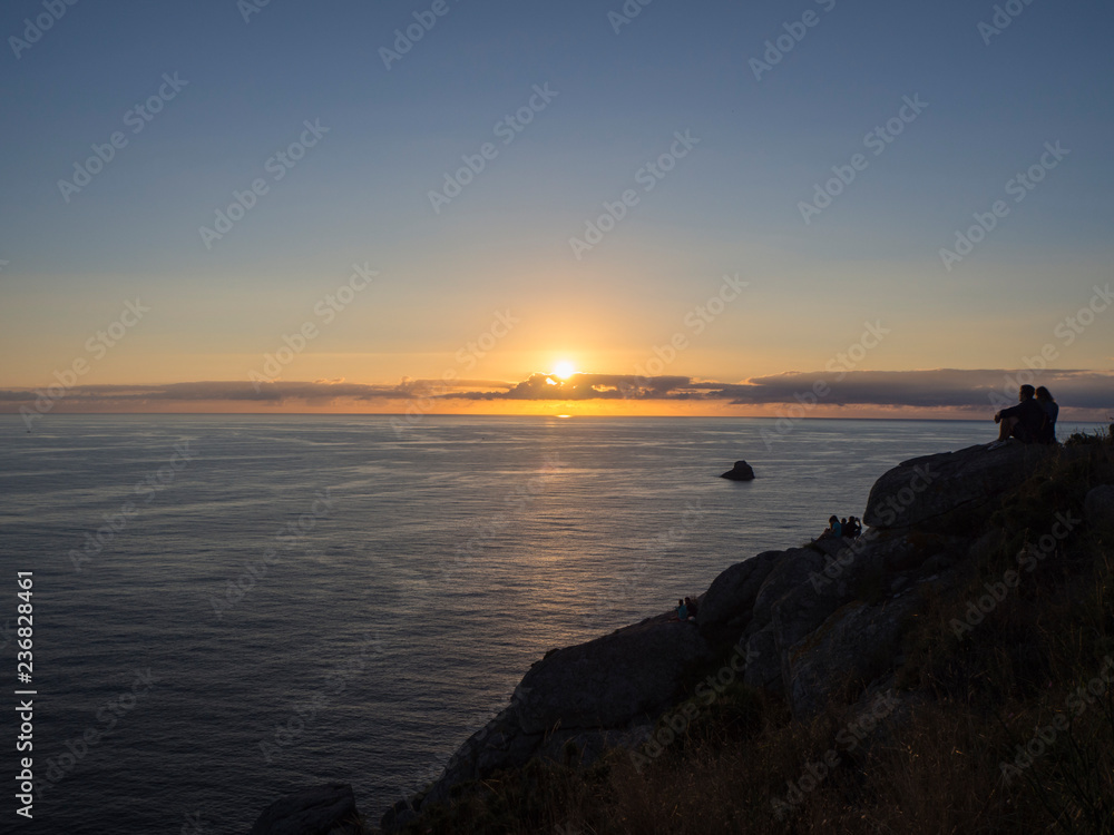 Atardecer en el Cabo de Finisterre, La Coruña, Galicia, vacaciones de verano en España, 2018