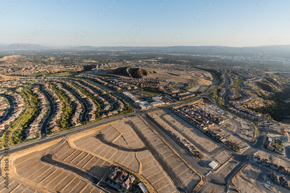 Aerial view of expansion in the City of Los Angeles.  New neighborhood construction in the Porter Ranch area of the San Fernando Valley.   