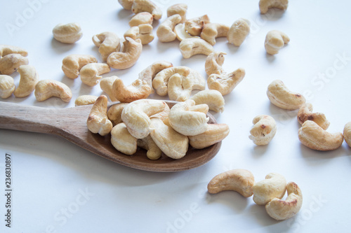 roasted cashew nuts on a white background