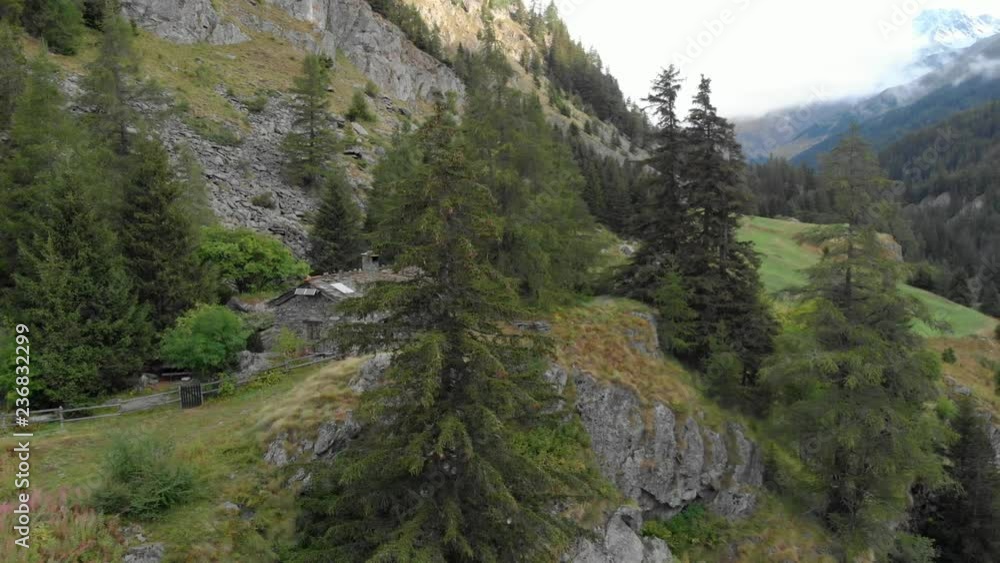Log Cabin on a precipice high up on the Swiss alps Log Cabin on a precipice high up on the Swiss alps