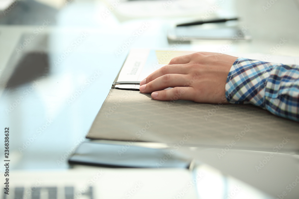 Fototapeta premium background image of a businessman sitting at his Desk