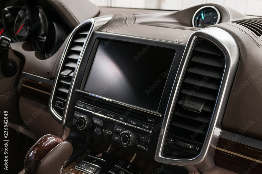 Naklejka premium Modern car dashboard. Interior detail.