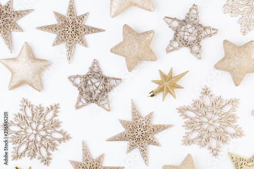 Christmas composition. Stars decorations, on white background. Christmas, winter, new year concept. Flat lay, top view, copy space.